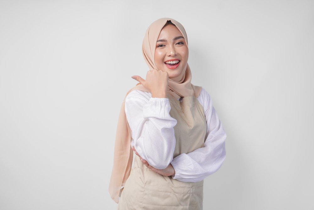 Excited Young Asian Muslim Woman In Hijab And Crea LXMMSXZ